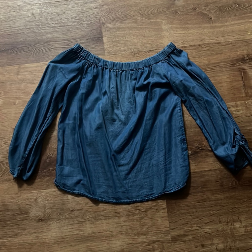Denim colored loose fitted off the shoulder blouse